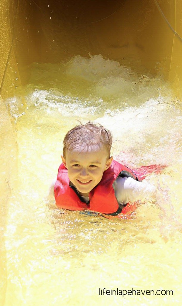 Life in Lape Haven: Going Naked at the Water Park - Elijah on a water slide