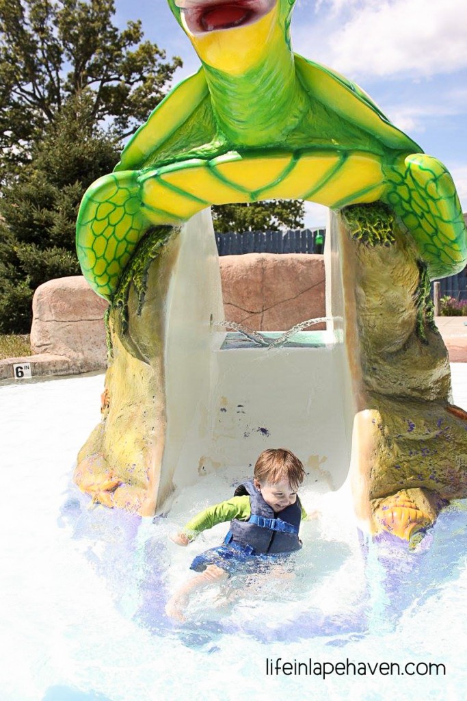 Life in Lape Haven: Going Naked at the Water Park - Josiah going down a water slide