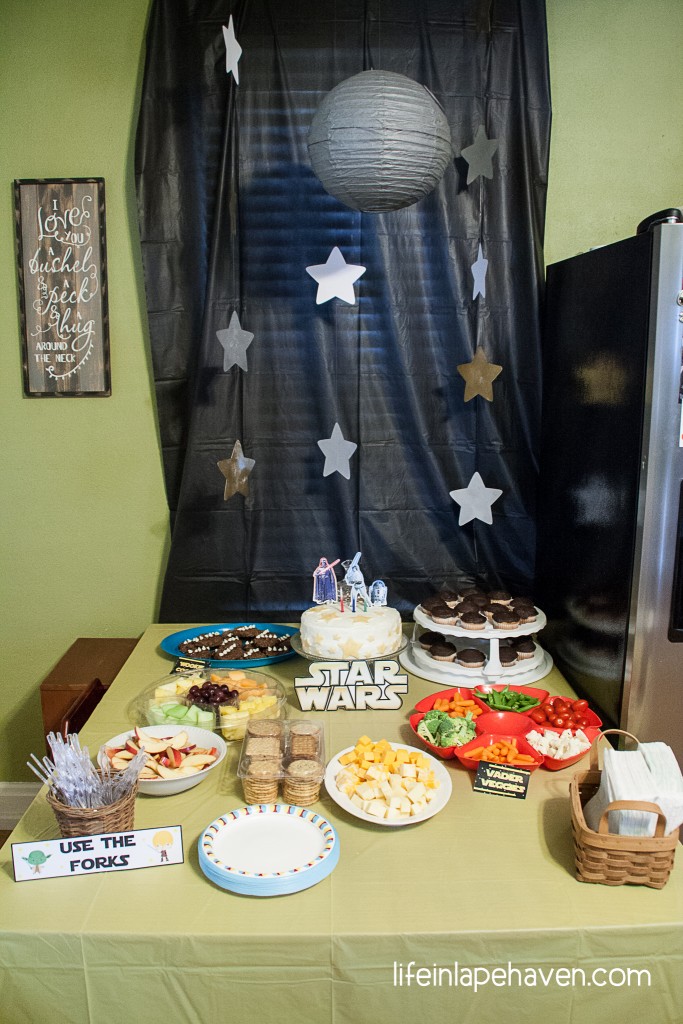 Life in Lape Haven: Josiah's Star Wars Birthday Party. Our littlest boy just turned three, and we celebrated with a fun Star Wars birthday party. Here is the scoop on our costumes, decorations, cake, and more with links to all the printables and recipes I used.